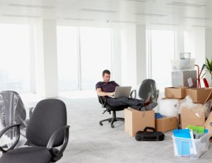 Businessman working in new office